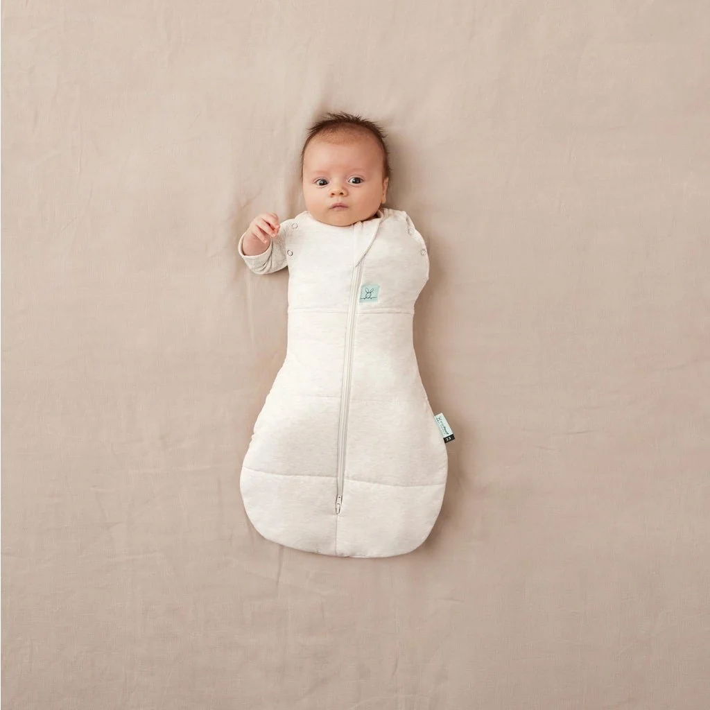 ergoPouch Zavinovačka a pytel na spaní 2v1 Cocoon Oatmeal Marle 0-3 m, 3-6 kg, 2,5 tog