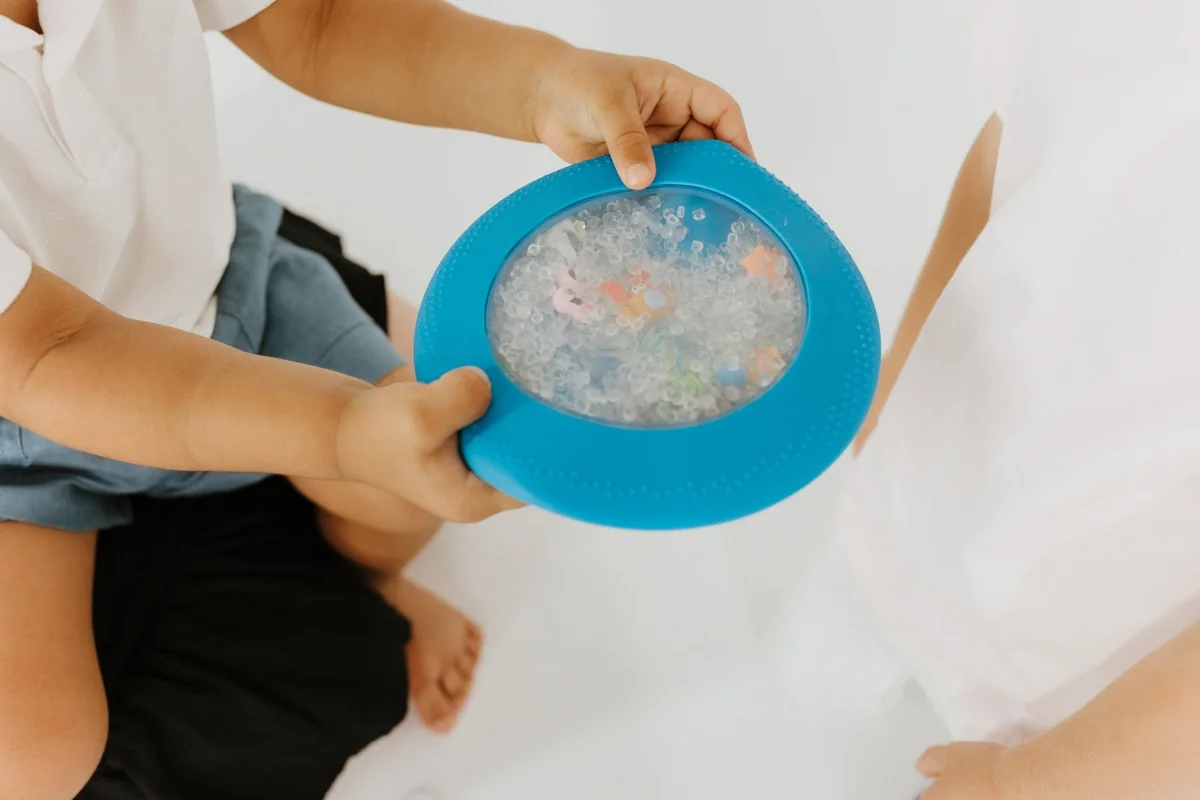 Jellystone Designs Senzorický disk Peekaboo, jednorožec