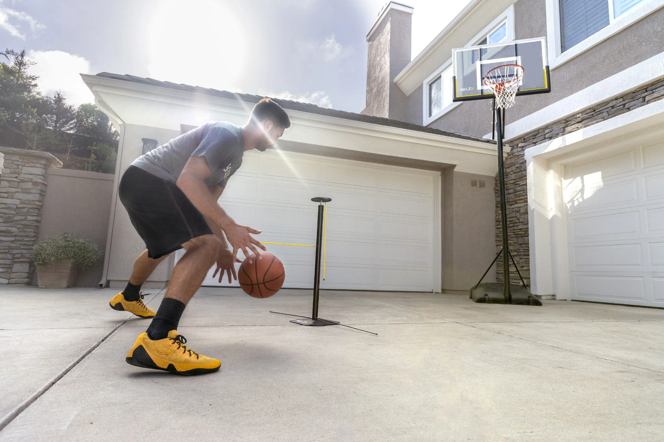 SKLZ Dribble Stick, driblingový trenažér