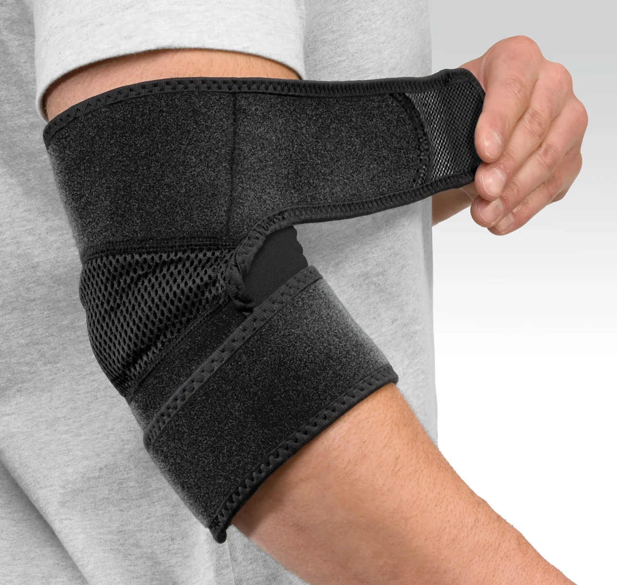 Mueller Adjustable Elbow Support, bandáž na loket