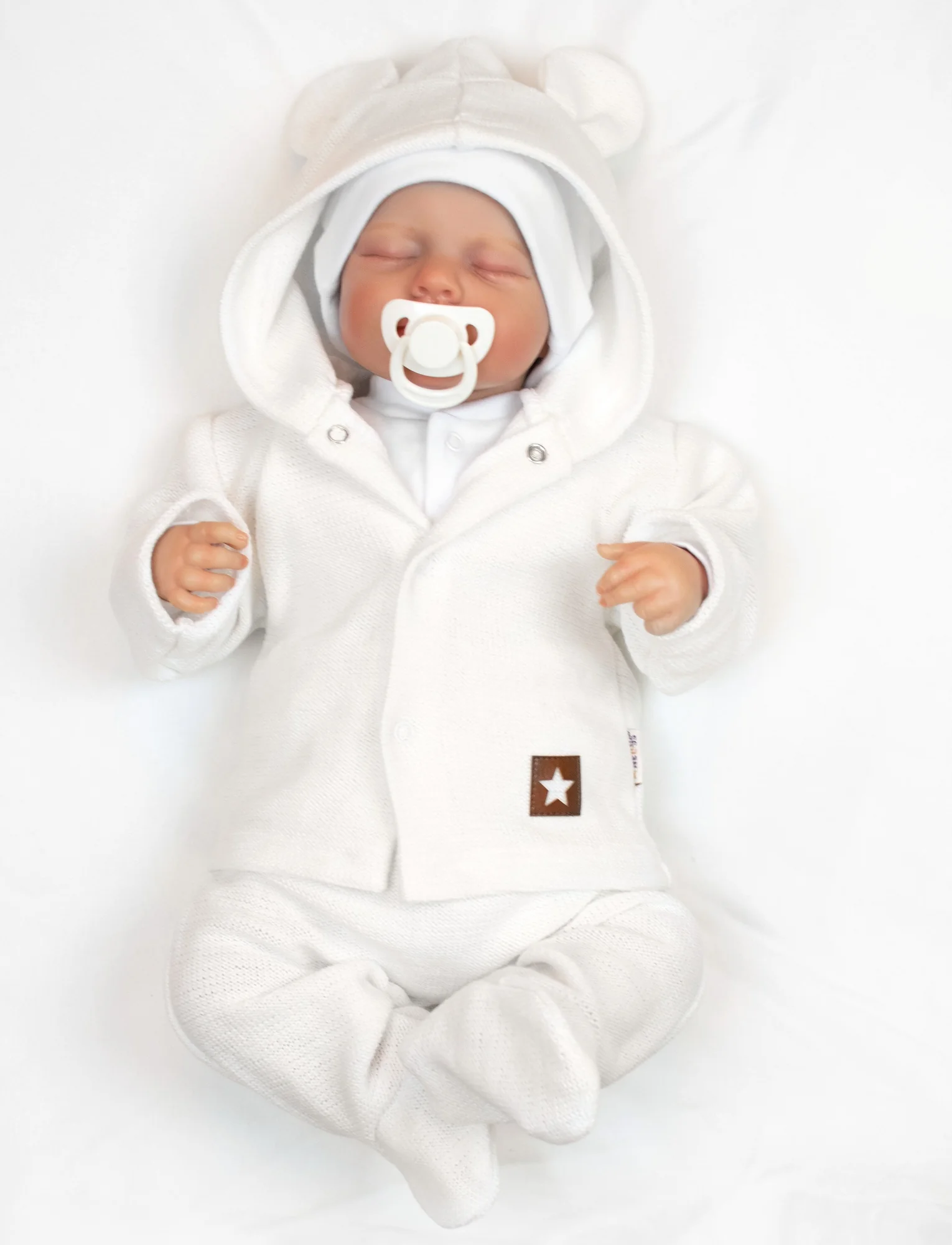 Baby Nellys Rostoucí oversize pletený svetřík pro miminko, bílé