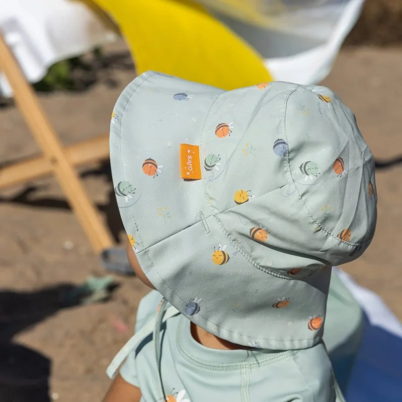 Saro Baby oboustranný klobouček s UV ochranou (6-18m) Bee Happy