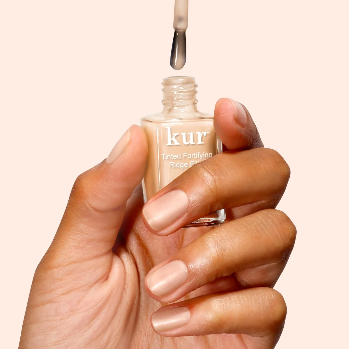 Londontown kur Tinted Ridge Filler Apricot Beige tónovaný lak na nehty 12 ml