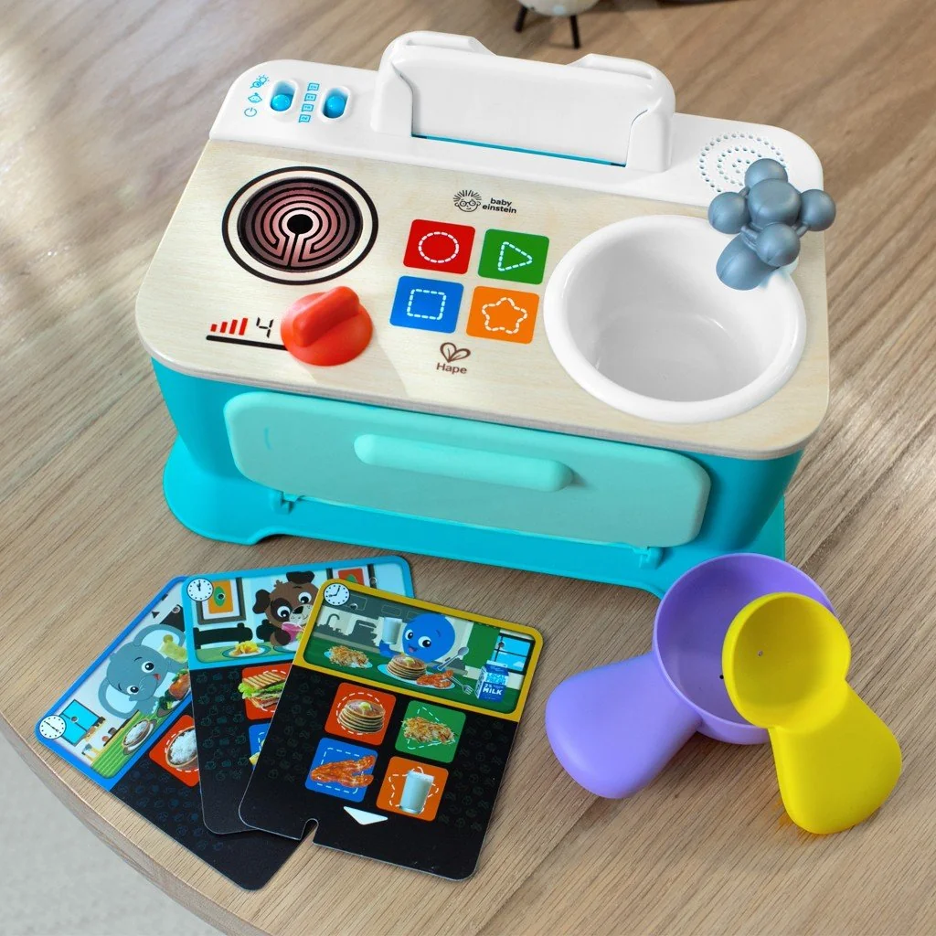 Baby Einstein Hračka hudební Kuchyňka Magic Touch Kitchen™ Pretend to Cook HAPE 9m+