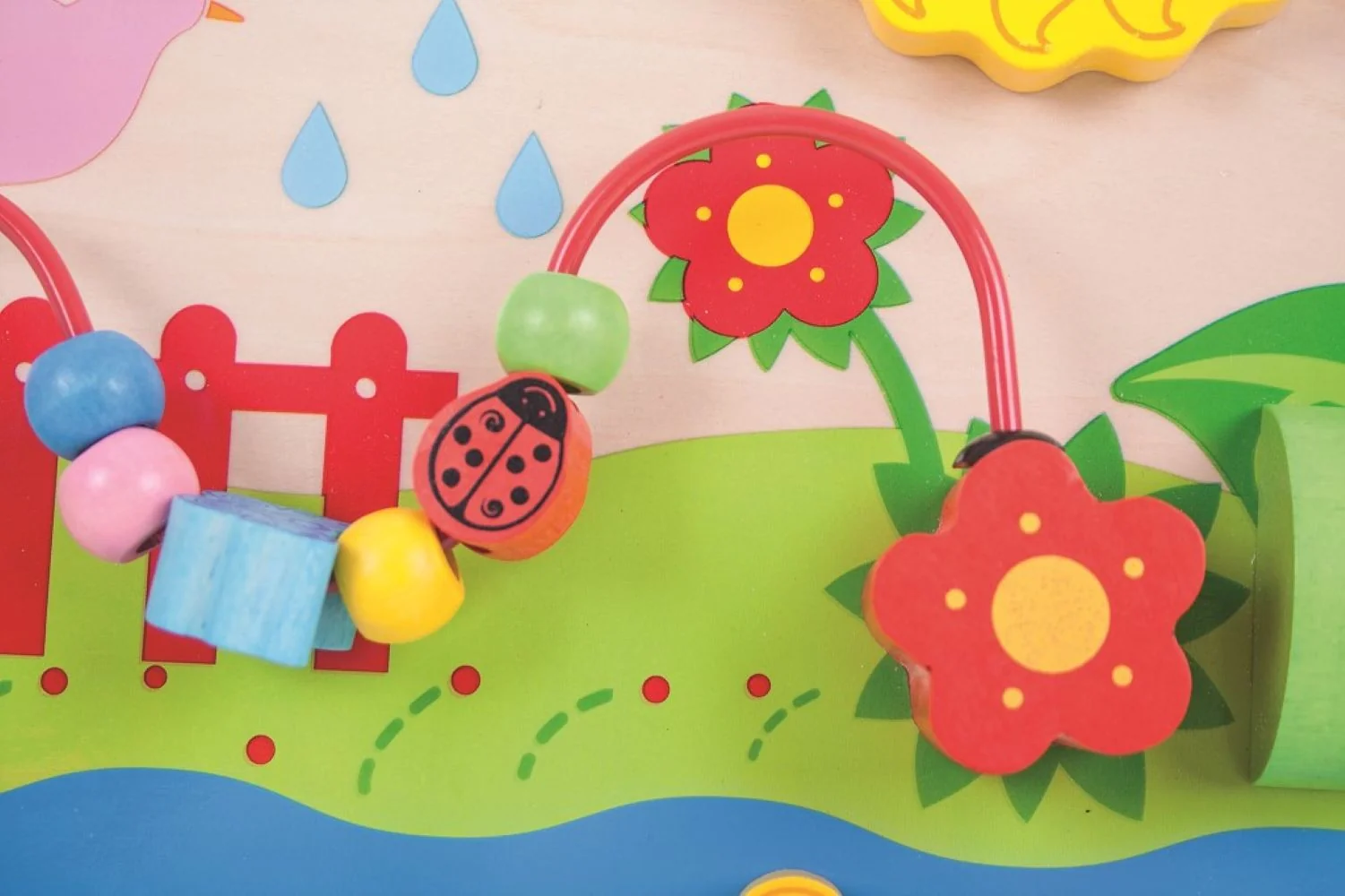 Bigjigs Toys Dřevěná motorická deska květy