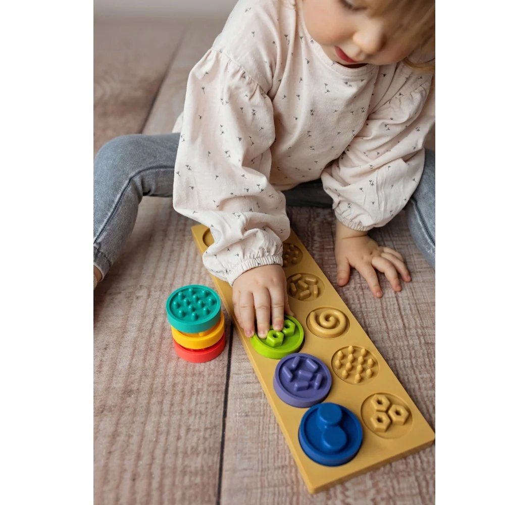 Hencz Toys Puzzle senzorická kolečka XL, pastelová