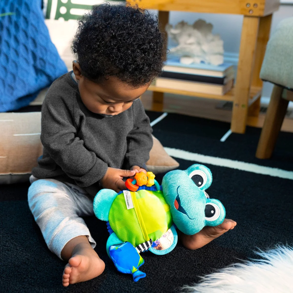 Baby Einstein Hračka aktivní na C kroužku želva Neptune’s Sensory Sidekick™ 0m+