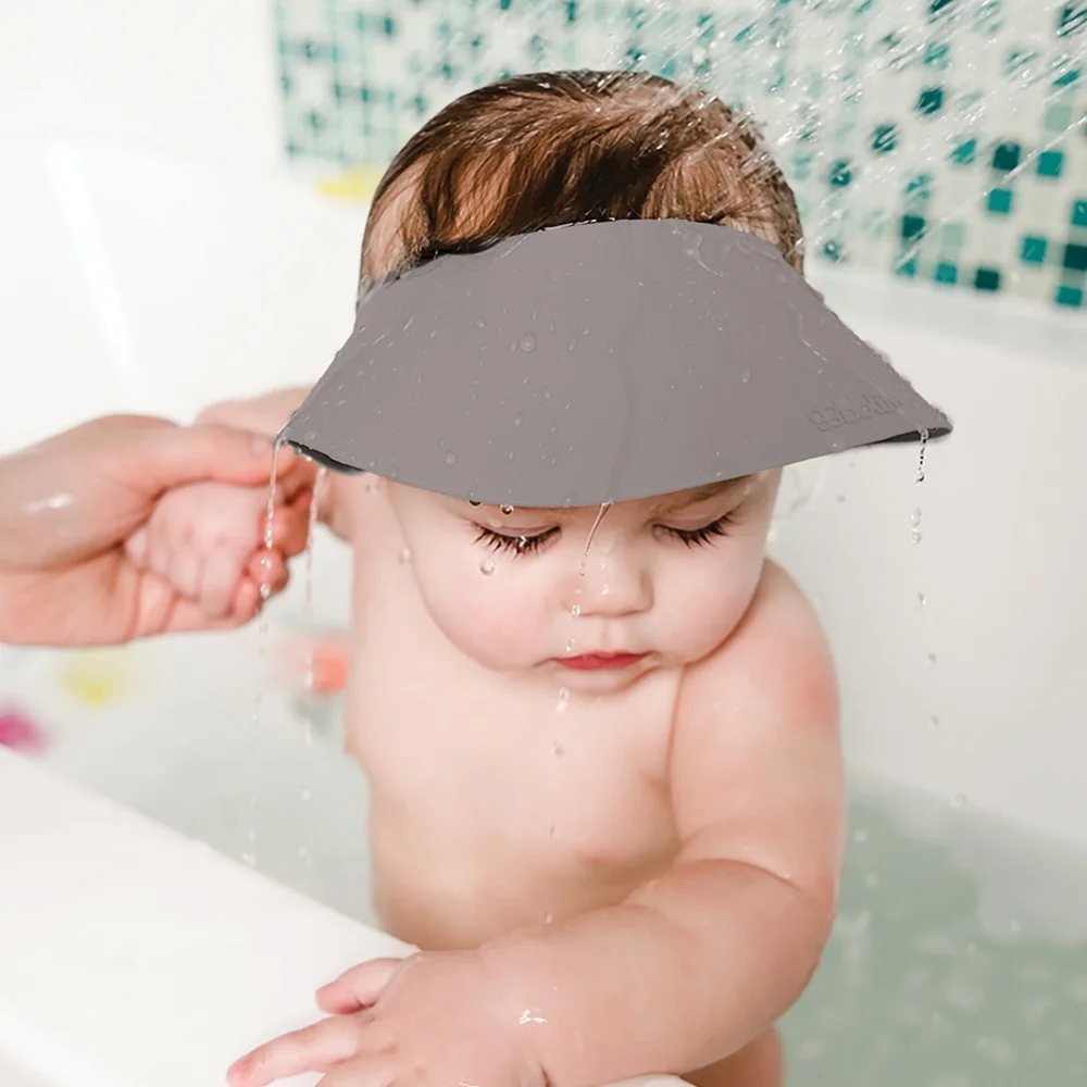 Bblüv Silikonový kšilt na mytí hlavy Käp 1 ks Grey
