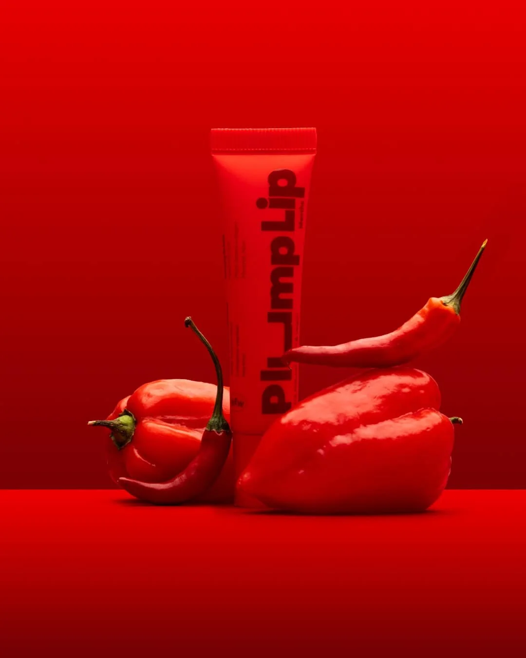 Trew Vyplňující a vyživující balzám na rty PlumpLip 15 ml