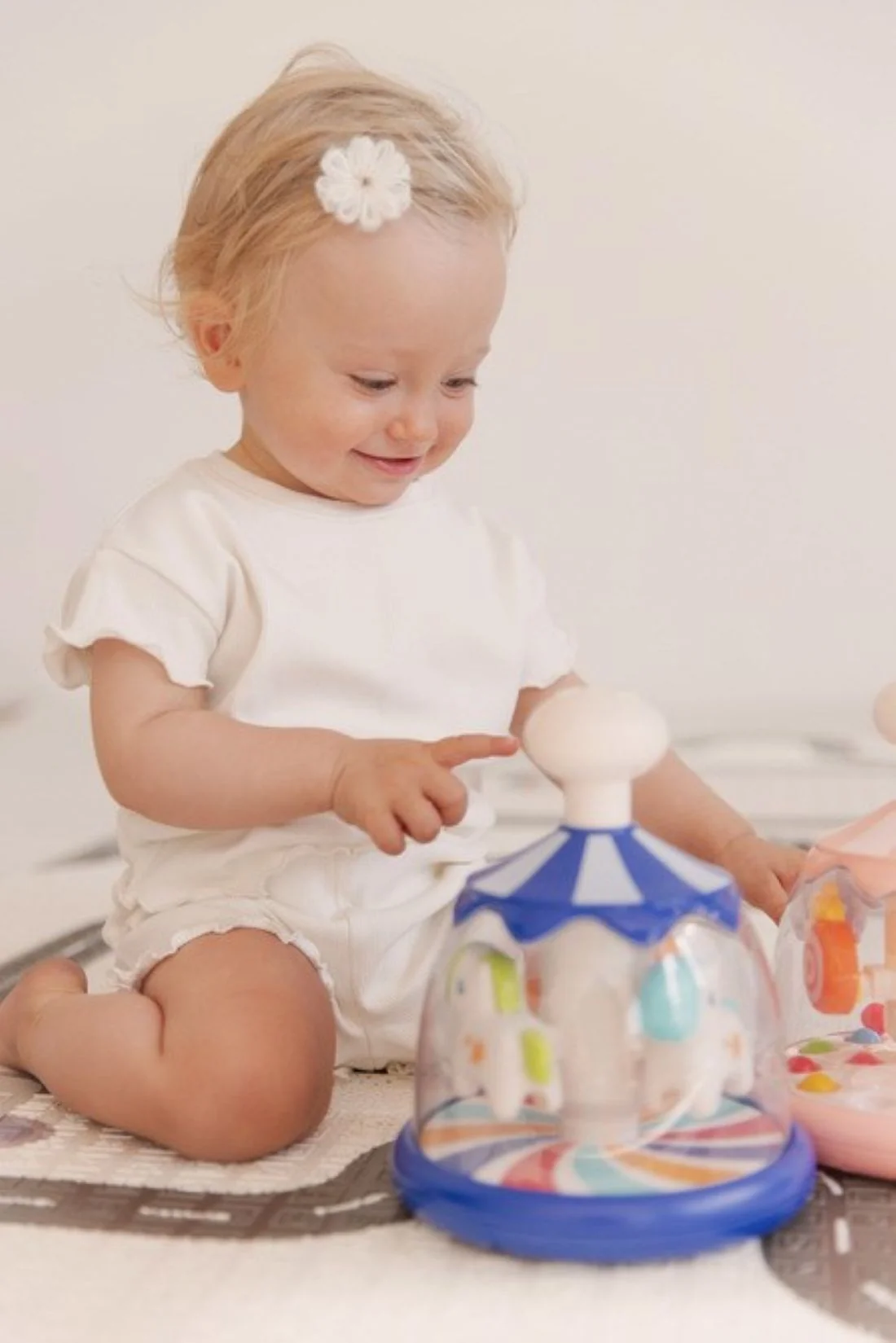 Toyz Toyz Edukační hračka Káča s koníky – modrá, kolotoč, 6m+