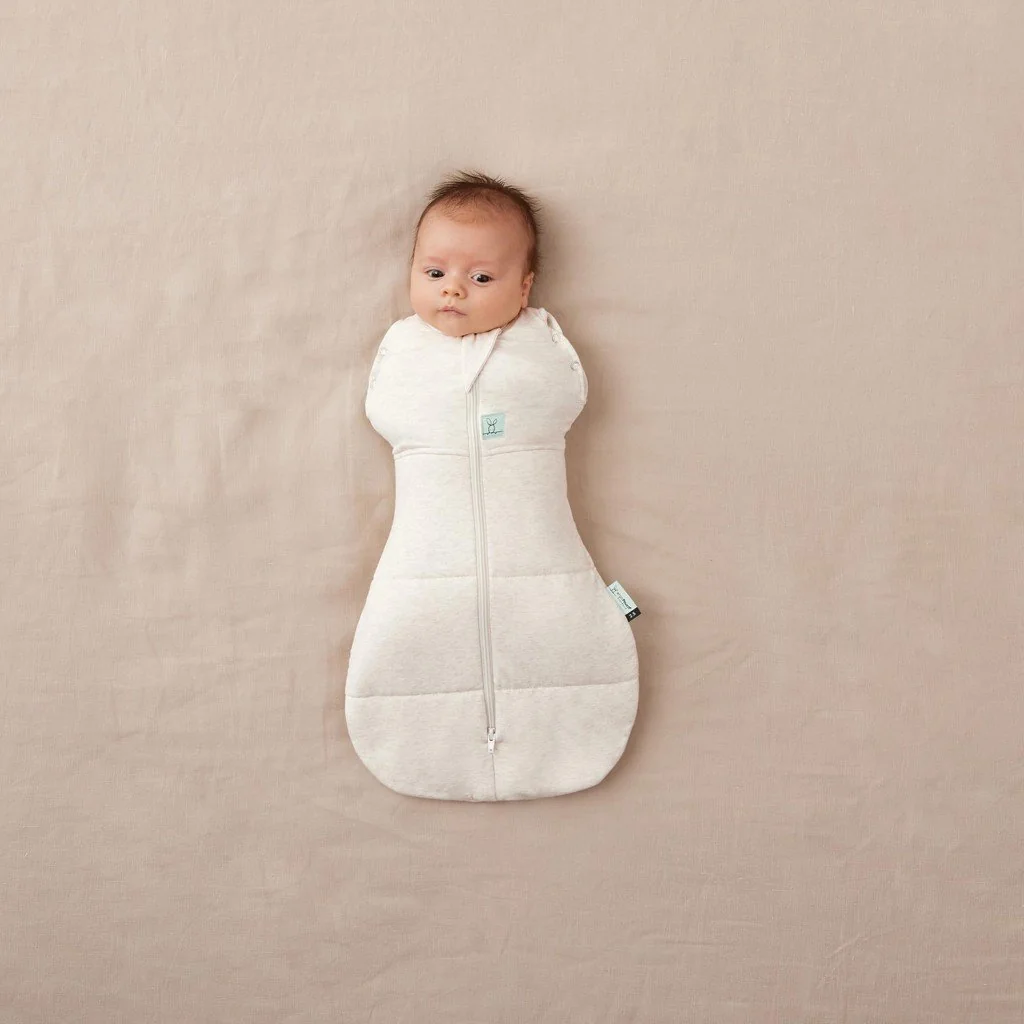 ergoPouch Zavinovačka a pytel na spaní 2v1 Cocoon Oatmeal Marle 6-12 m, 8-10 kg, 2,5 tog
