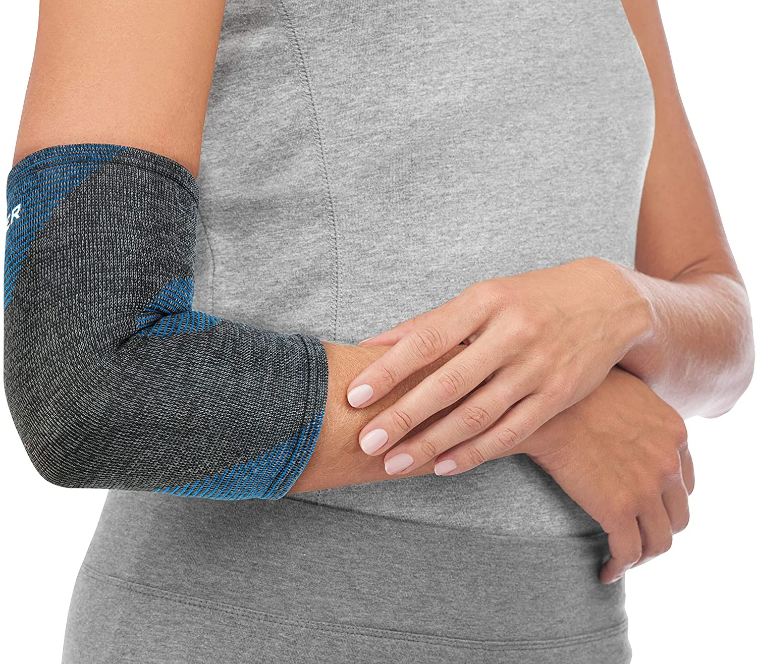 Mueller 4-Way Stretch Premium Knit Elbow Support, bandáž na loket, Velikost: L/XL Velikost: L/XL
